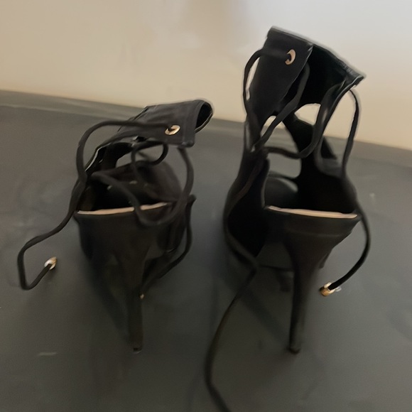 Black high heel sandals with back ties in the back and open toe. - Picture 3 of 5